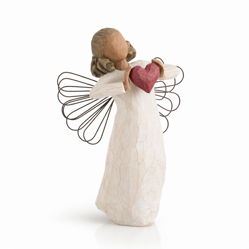With Love Angel figurine holding a red heart as a heartfelt love gift